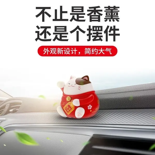 Nước hoa hình chú mèo thần tài để kệ xe ô tô